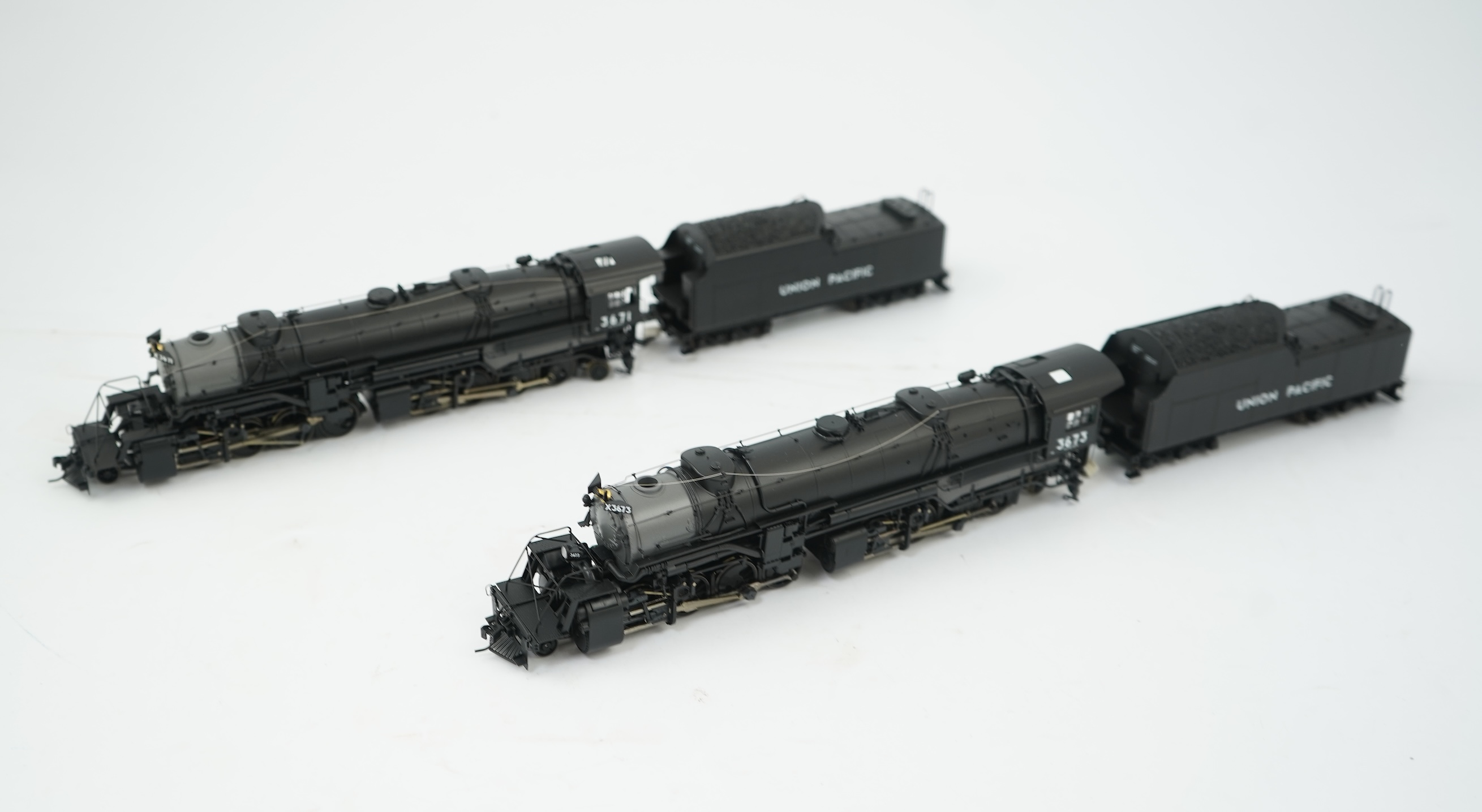 Two boxed HO gauge Proto 2000 Heritage Union Pacific locomotives; (23342) model of 3671, 2-8-8-2 tender locomotive, and (23343) model of 3673, 2-8-8-2 tender locomotive, both powered for two rail operation.